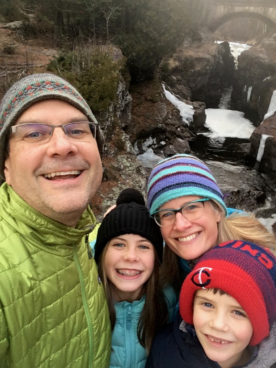 Peder and his family on a winter hike at a northern Minnesota waterfall